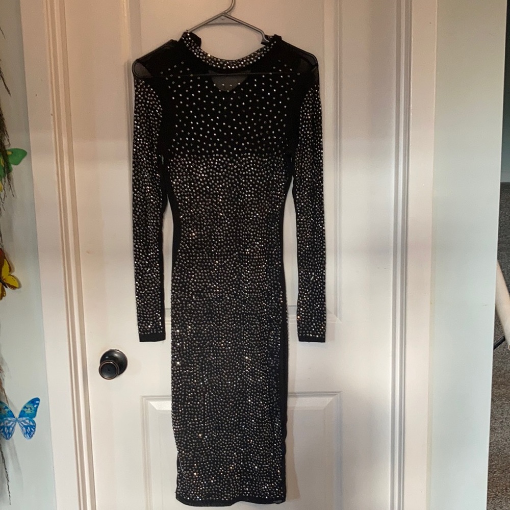 Worn once Akira One small tear other than that Perfect condition! Size small